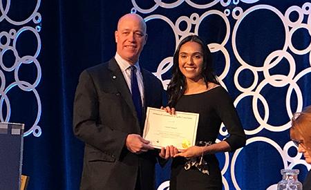 Lauren Navarro accepts ACHE award